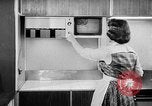 Image of modern kitchen New York City USA, 1954, second 58 stock footage video 65675070193