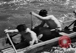 Image Native American Indian course de canoë Bellingham Washington USA, 1957, de la seconde 52 séquences d'archives historiques vidéo 65675070200