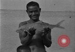 Image of fishermen Hawaii USA, 1924, second 42 stock footage video 65675070227