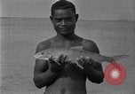 Image of fishermen Hawaii USA, 1924, second 46 stock footage video 65675070227