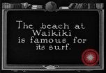 Image of Hawaiian people surfing Honolulu Hawaii USA, 1924, second 1 stock footage video 65675070228