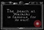 Image of Hawaiian people surfing Honolulu Hawaii USA, 1924, second 4 stock footage video 65675070228