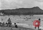 Image of Hawaiian people surfing Honolulu Hawaii USA, 1924, second 11 stock footage video 65675070228