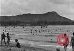 Image of Hawaiian people surfing Honolulu Hawaii USA, 1924, second 13 stock footage video 65675070228