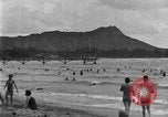 Image of Hawaiian people surfing Honolulu Hawaii USA, 1924, second 14 stock footage video 65675070228