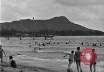 Image of Hawaiian people surfing Honolulu Hawaii USA, 1924, second 15 stock footage video 65675070228