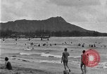 Image of Hawaiian people surfing Honolulu Hawaii USA, 1924, second 16 stock footage video 65675070228