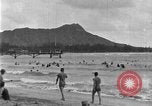 Image of Hawaiian people surfing Honolulu Hawaii USA, 1924, second 17 stock footage video 65675070228
