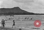 Image of Hawaiian people surfing Honolulu Hawaii USA, 1924, second 19 stock footage video 65675070228