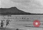 Image of Hawaiian people surfing Honolulu Hawaii USA, 1924, second 20 stock footage video 65675070228
