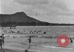 Image of Hawaiian people surfing Honolulu Hawaii USA, 1924, second 21 stock footage video 65675070228