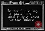 Image of Hawaiian people surfing Honolulu Hawaii USA, 1924, second 23 stock footage video 65675070228