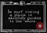 Image of Hawaiian people surfing Honolulu Hawaii USA, 1924, second 25 stock footage video 65675070228