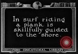 Image of Hawaiian people surfing Honolulu Hawaii USA, 1924, second 27 stock footage video 65675070228