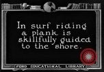 Image of Hawaiian people surfing Honolulu Hawaii USA, 1924, second 30 stock footage video 65675070228
