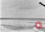 Image of Hawaiian people surfing Honolulu Hawaii USA, 1924, second 36 stock footage video 65675070228
