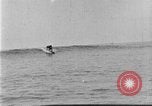 Image of Hawaiian people surfing Honolulu Hawaii USA, 1924, second 37 stock footage video 65675070228