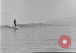 Image of Hawaiian people surfing Honolulu Hawaii USA, 1924, second 40 stock footage video 65675070228