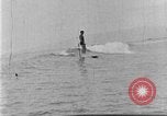 Image of Hawaiian people surfing Honolulu Hawaii USA, 1924, second 42 stock footage video 65675070228