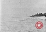 Image of Hawaiian people surfing Honolulu Hawaii USA, 1924, second 44 stock footage video 65675070228