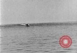 Image of Hawaiian people surfing Honolulu Hawaii USA, 1924, second 45 stock footage video 65675070228