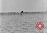 Image of Hawaiian people surfing Honolulu Hawaii USA, 1924, second 46 stock footage video 65675070228