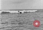Image of Hawaiian people surfing Honolulu Hawaii USA, 1924, second 53 stock footage video 65675070228