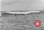 Image of Hawaiian people surfing Honolulu Hawaii USA, 1924, second 55 stock footage video 65675070228