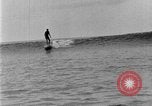 Image of Hawaiian people surfing Honolulu Hawaii USA, 1924, second 60 stock footage video 65675070228
