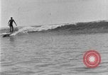 Image of Hawaiian people surfing Honolulu Hawaii USA, 1924, second 62 stock footage video 65675070228