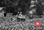 Image of tractor-drawn wagon United States USA, 1919, second 13 stock footage video 65675070231