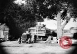 Image of tractor-drawn wagon United States USA, 1919, second 33 stock footage video 65675070231