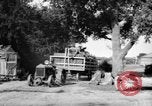 Image of tractor-drawn wagon United States USA, 1919, second 34 stock footage video 65675070231