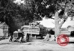 Image of tractor-drawn wagon United States USA, 1919, second 35 stock footage video 65675070231