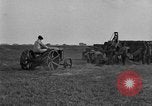 Image of tractor-drawn wagon United States USA, 1919, second 55 stock footage video 65675070231