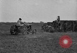 Image of tractor-drawn wagon United States USA, 1919, second 56 stock footage video 65675070231