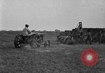 Image of tractor-drawn wagon United States USA, 1919, second 57 stock footage video 65675070231