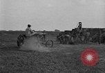 Image of tractor-drawn wagon United States USA, 1919, second 58 stock footage video 65675070231