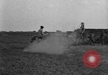 Image of tractor-drawn wagon United States USA, 1919, second 59 stock footage video 65675070231
