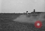 Image of tractor-drawn wagon United States USA, 1919, second 60 stock footage video 65675070231