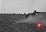 Image of tractor-drawn wagon United States USA, 1919, second 61 stock footage video 65675070231
