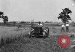 Image of tractor-drawn binder United States USA, 1919, second 5 stock footage video 65675070232