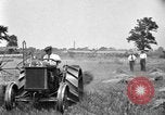 Image of tractor-drawn binder United States USA, 1919, second 9 stock footage video 65675070232