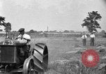 Image of tractor-drawn binder United States USA, 1919, second 10 stock footage video 65675070232