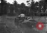 Image of tractor-drawn binder United States USA, 1919, second 15 stock footage video 65675070232