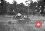 Image of tractor-drawn binder United States USA, 1919, second 16 stock footage video 65675070232