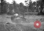 Image of tractor-drawn binder United States USA, 1919, second 17 stock footage video 65675070232
