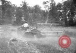 Image of tractor-drawn binder United States USA, 1919, second 18 stock footage video 65675070232