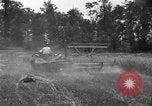 Image of tractor-drawn binder United States USA, 1919, second 19 stock footage video 65675070232