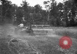 Image of tractor-drawn binder United States USA, 1919, second 20 stock footage video 65675070232